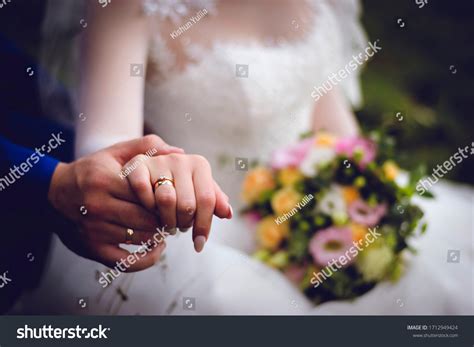 Husband Wife Hands Wedding Rings Hands Stock Photo 1712949424