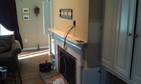 How to mount a tv above a fireplace and hide wires for wall mounted tv. Wallingford CT mount tv on wall | Home Theater Installation