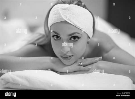 Woman Laying On Massage Table Stock Photo Alamy
