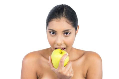 Premium Photo Happy Nude Brunette Eating Green Apple