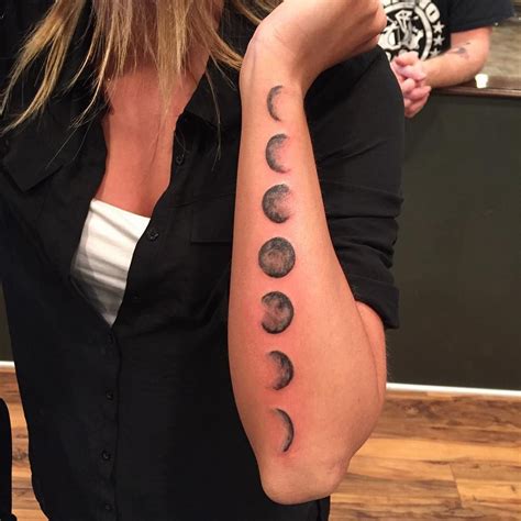 Black Ink Phases Of The Moon Tattoo On Left Arm Tattoos Back Tattoo