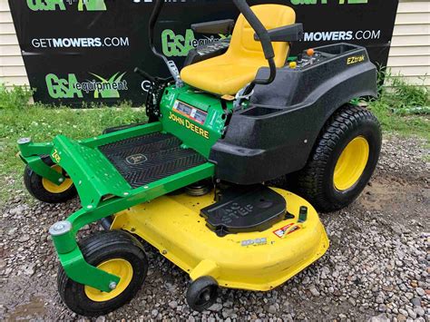 IN JOHN DEERE Z ZERO TURN MOWER WITH ONLY HOURS A MONTH