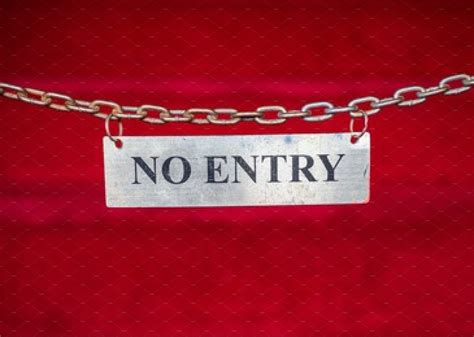 No Entry Sign On Chain In Front Of Red Carpet Background Architecture