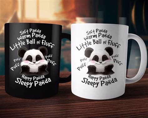 Two Black And White Coffee Mugs With Panda Faces On Them One For Each