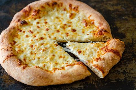 This White Pizza Sauce Is Essentially An Easy Garlic Alfredo Sauce It