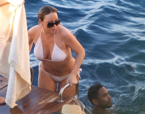 Simply DJ Mariah Carey Flaunts Her Curves In Bikini