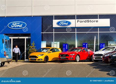 Cars In Front Of Ford Motor Company Dealership Building Editorial Stock