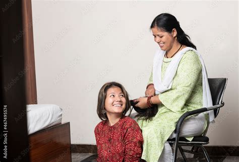 An Indian Girl Getting Her Head Massage By Her Mother Daughter And Mother Love For Mothers Day