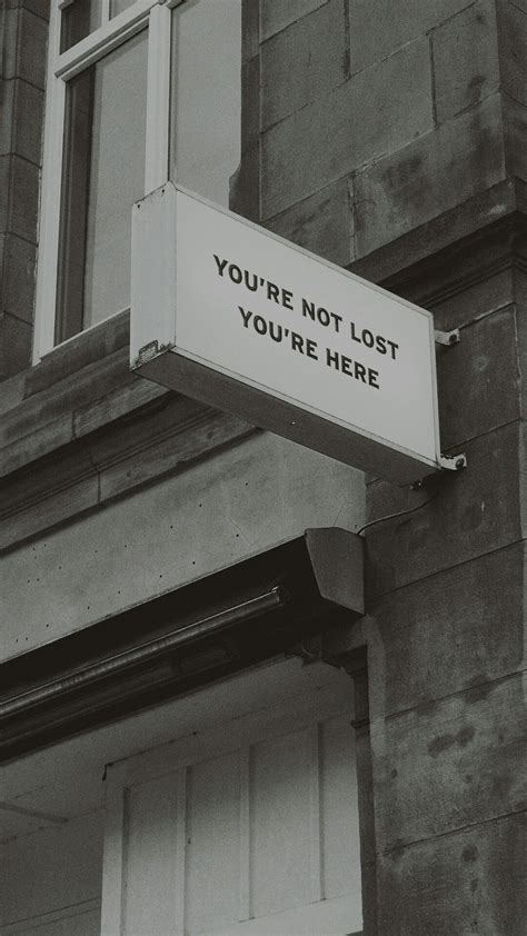 A Sign On The Side Of A Building That Says Youre Not Lost Youre Here
