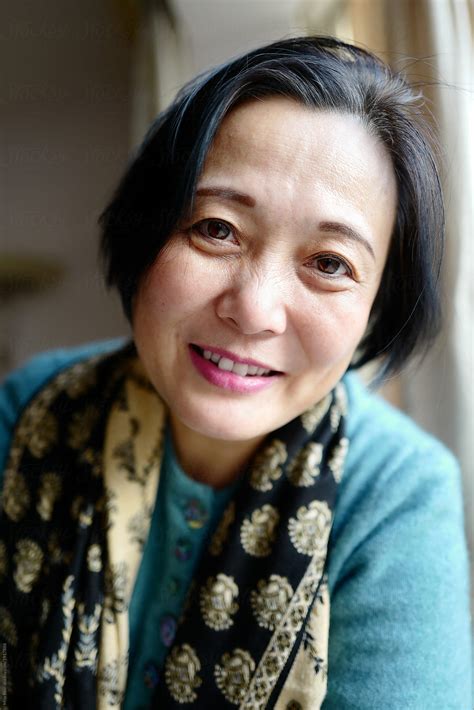 Sixty Year Old Charming Chinese Lady By Stocksy Contributor Rein