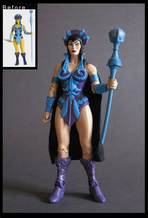 An Action Figure Is Shown With A Hammer In Her Hand And A Purple Outfit On