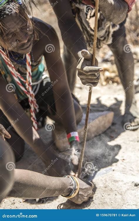 hadzabe men making fire editorial photo image of local 159670781
