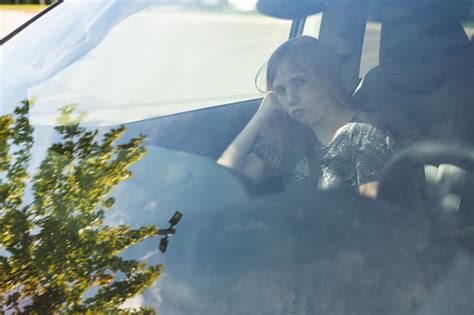 Saddepressed Teen Girl Sitting In A Carsuv While Being Driven Topicked