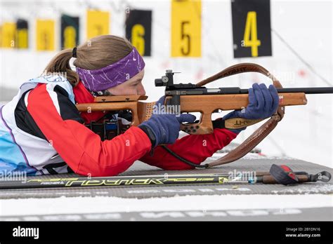 russian sportswoman biathlete vakhrusheva valentina rifle shooting in prone position biathlete