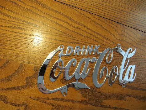 Drink Coca Cola Script Chrome Finish Metal Sign License Plate Signs