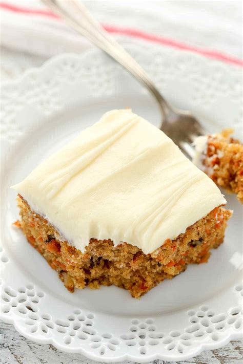 A Moist Carrot Cake Filled With Crushed Pineapple And Chopped Walnuts