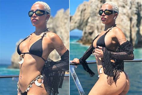 Doja Cat Sizzles While Showing Off Her Curves In A Thong Bikini
