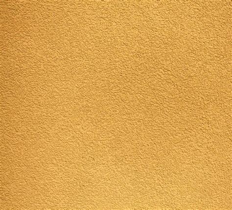 Yellow Rugged Plaster Wall Texture Or Background Plaster