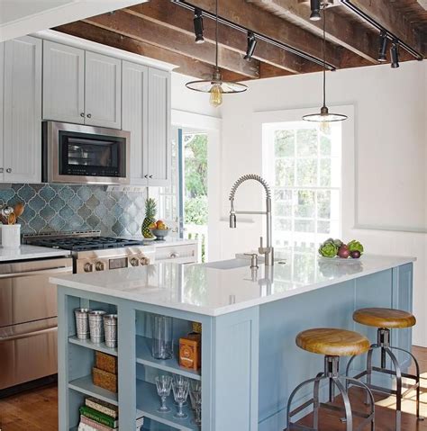 Transitional Kitchen Displaying A Sky Blue Kitchen Island With Shelves