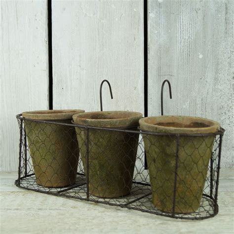 Great prices on patio & garden items. Adorable wire window box with three terracotta pots. http ...