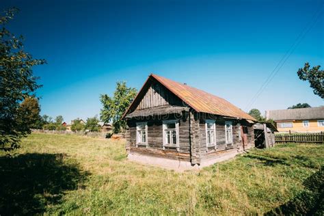 Old Russian Traditional Wooden House In Village Of Belarus Or Russia