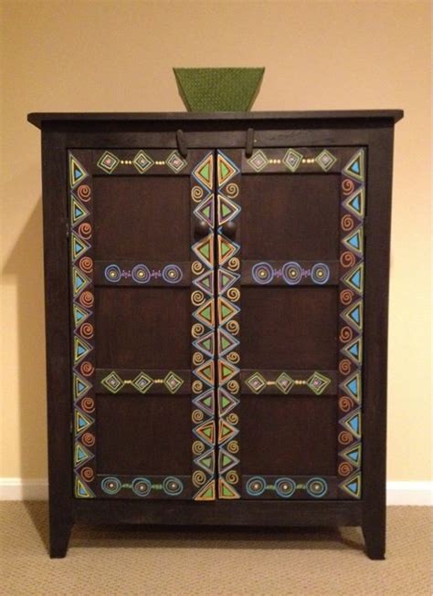 Inspiration Africa Basic Black Cabinet And Lots Of Paint Pens Black