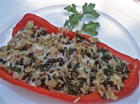 Veggies Spice And Everything Rice Peppers Stuffed With Wild Rice And