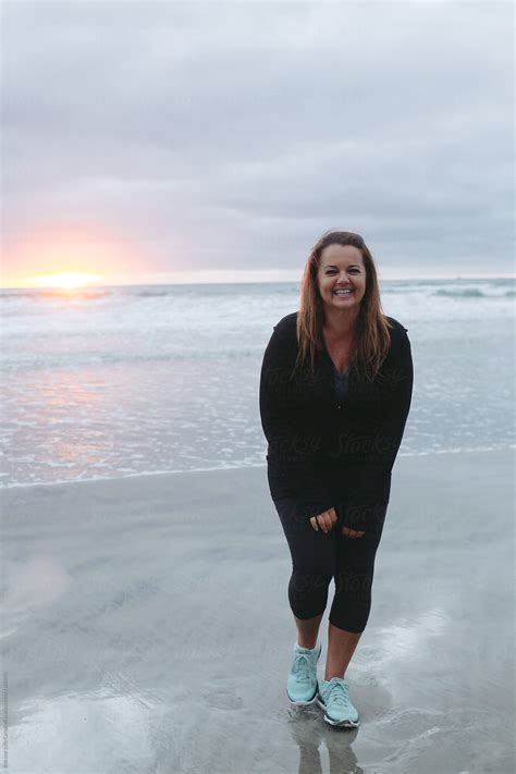Happy Candid Portraits Of Woman On Beach At Sunset By Stocksy Contributor Rob And Julia