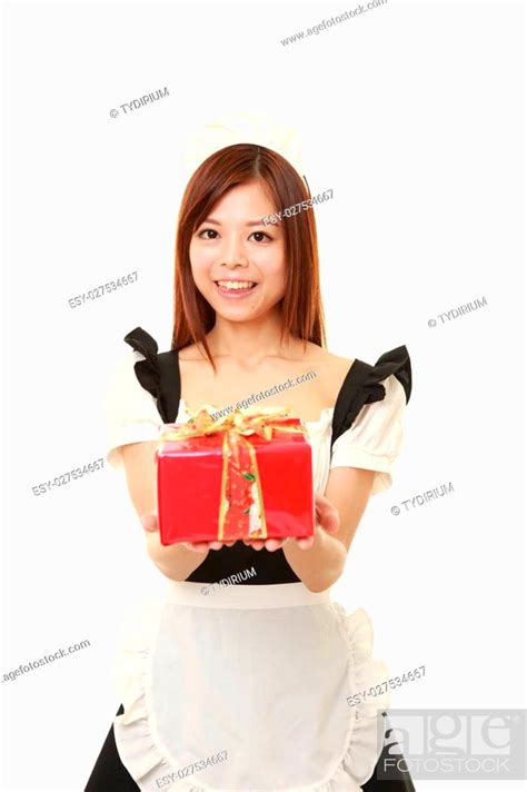 Portrait Of Young Japanese Woman Wearing French Maid Costume Stock
