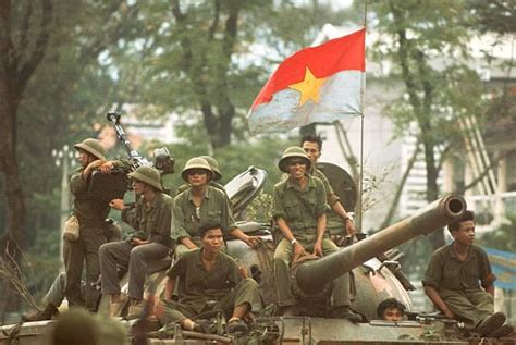 Soldiers Of The North Vietnamese Army Riding In To Saigon On A T 54