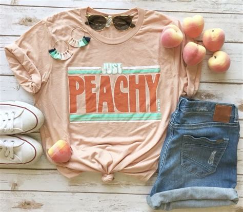Check Out Our Just Peachy Tee This Tee Is Super Comfy And A Unisex Fit