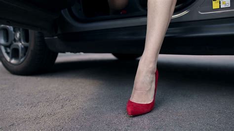 Womans Legs In Red High Heels Stepping Out Of Car Stock Video Footage