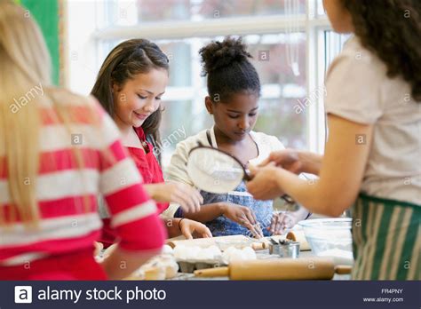 Middle School Students In Cooking Class Stock Photo Alamy