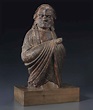 A CAST-IRON BUST OF BODHIDHARMA