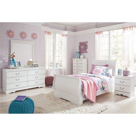 Showcasing a light airy finish with a subtle pearl effect, this beautiful bedroom set exudes the perfect amount of glam and sophistication. Signature Design by Ashley Anarasia 4 Piece Twin Bedroom ...