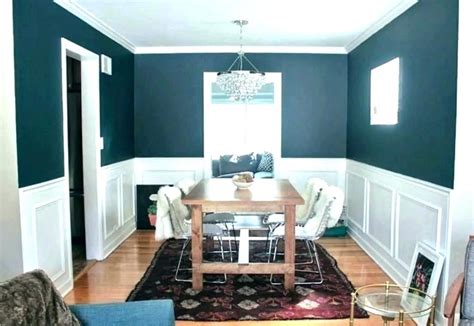 Bold accents and pops of teal add sizzle to handsome gray finishes. two tone gray walls - insidehbs.com | Living room paint ...
