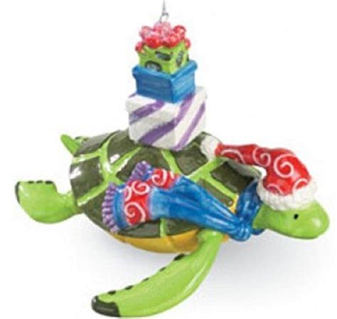 Sea Turtle Christmas Ornament Wearing A Santa Hat And Scarf Carrying