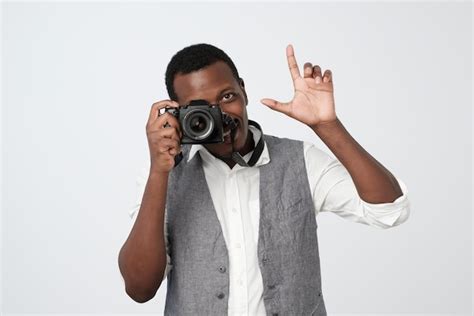 Premium Photo Young African Photographer At Work At Studio