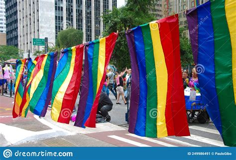 lgbtqi flags on avenida paulista on the day of the gay parade symbolizing the cause of freedom