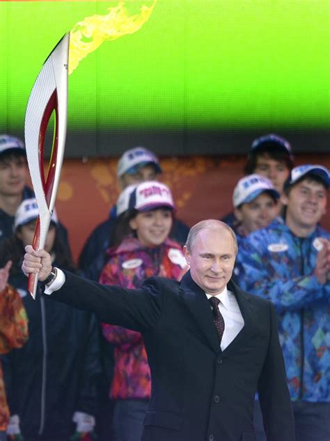 Vladimir Putin Lights Olympic Flame For Sochi On Red Square
