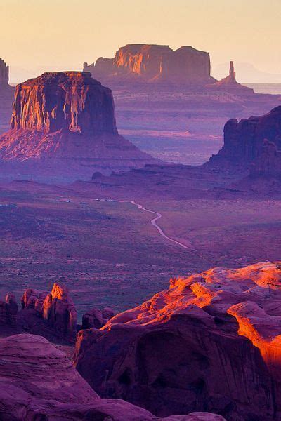 The Desert Is Full Of Rock Formations At Sunset