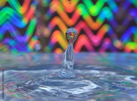 Water Splash Against Multicoloured Background Stock Photo Adobe Stock