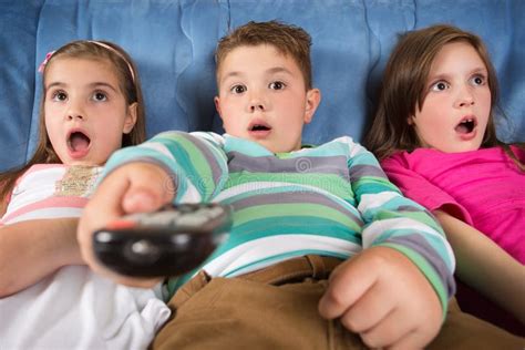 Surprised Children Watching Tv Stock Photo Image Of People Room