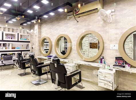View Inside Of A Modern Salon Showing Mirrors And Sitting Arrangement