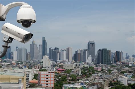 Surveillance Security Camera Or Cctv Over City