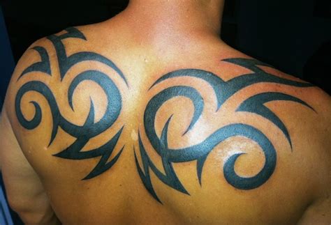 28 Awesome Tribal Back Tattoos