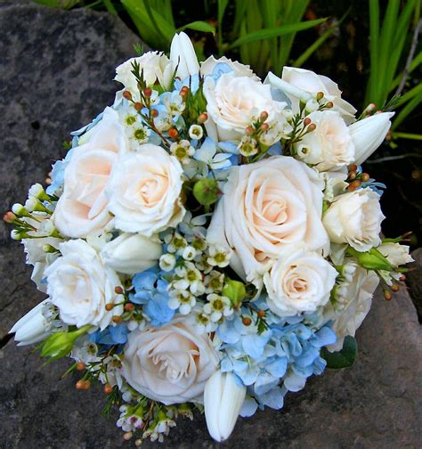 Round Wedding Bouquet Featuring Blue Hydrangea White Tulips Cream