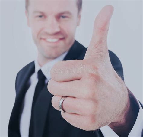 Attractive Man Is Showing Thumbs Up Sign With Happiness Stock Photo