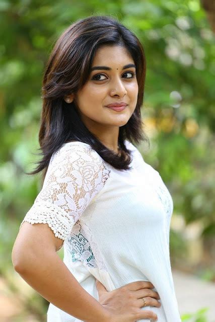 niveda thomas latest hot spicy glamour photoshoot images in white top tollywood idle