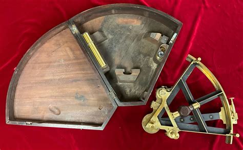lot cased brass t frame sextant late 18th early 19th century case height 4 5” width 15
